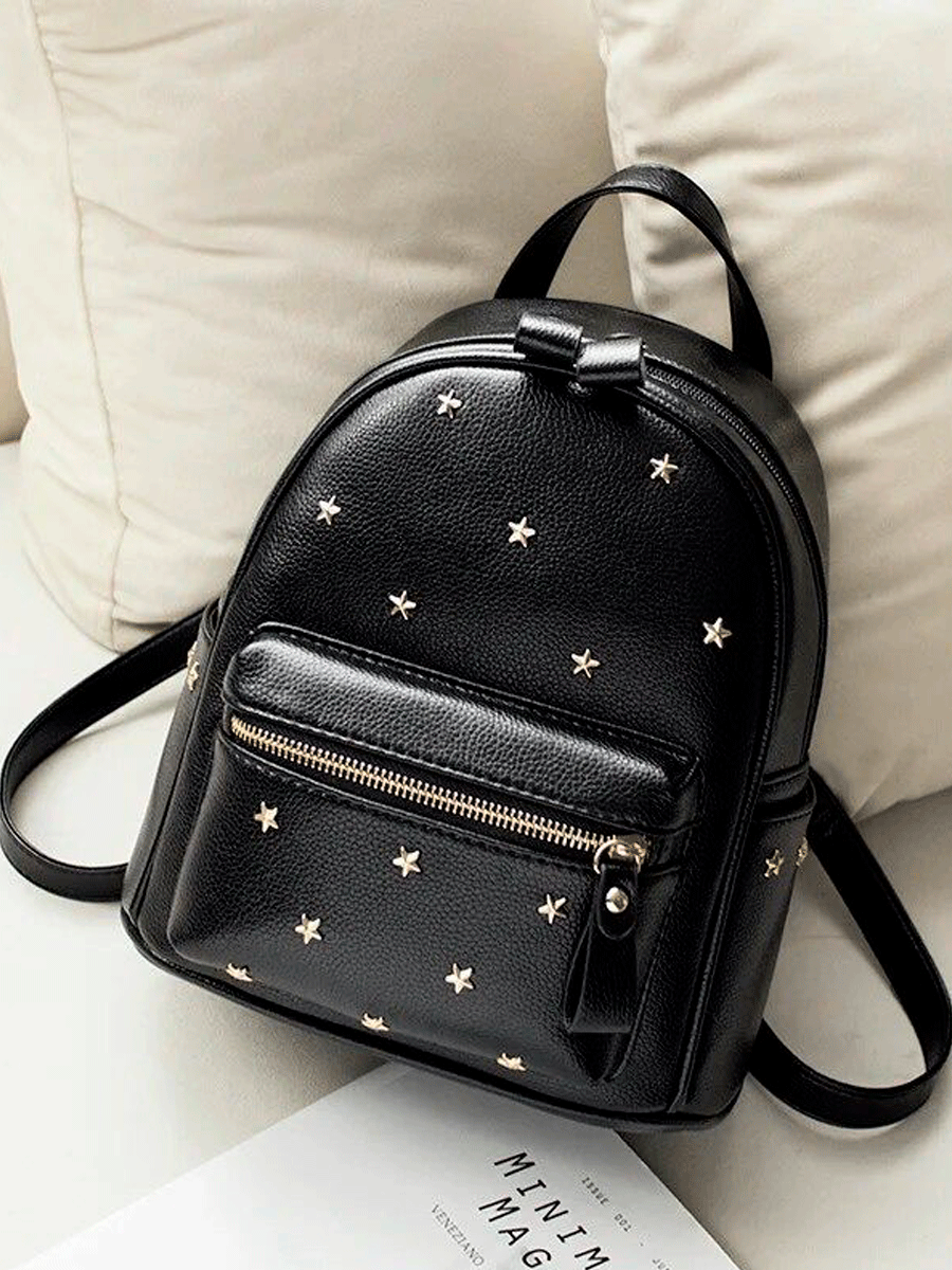 Mochila de polipiel tachas estrellas doradas